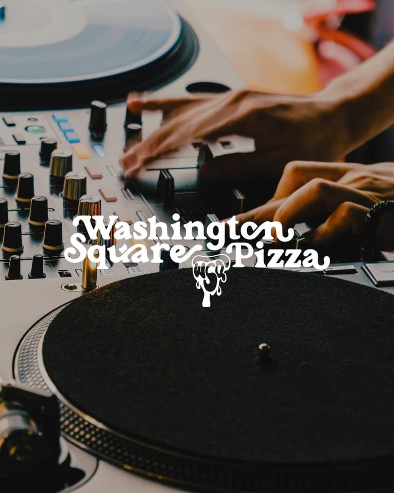 Hands operating a DJ mixer and two turntables with vinyl records.